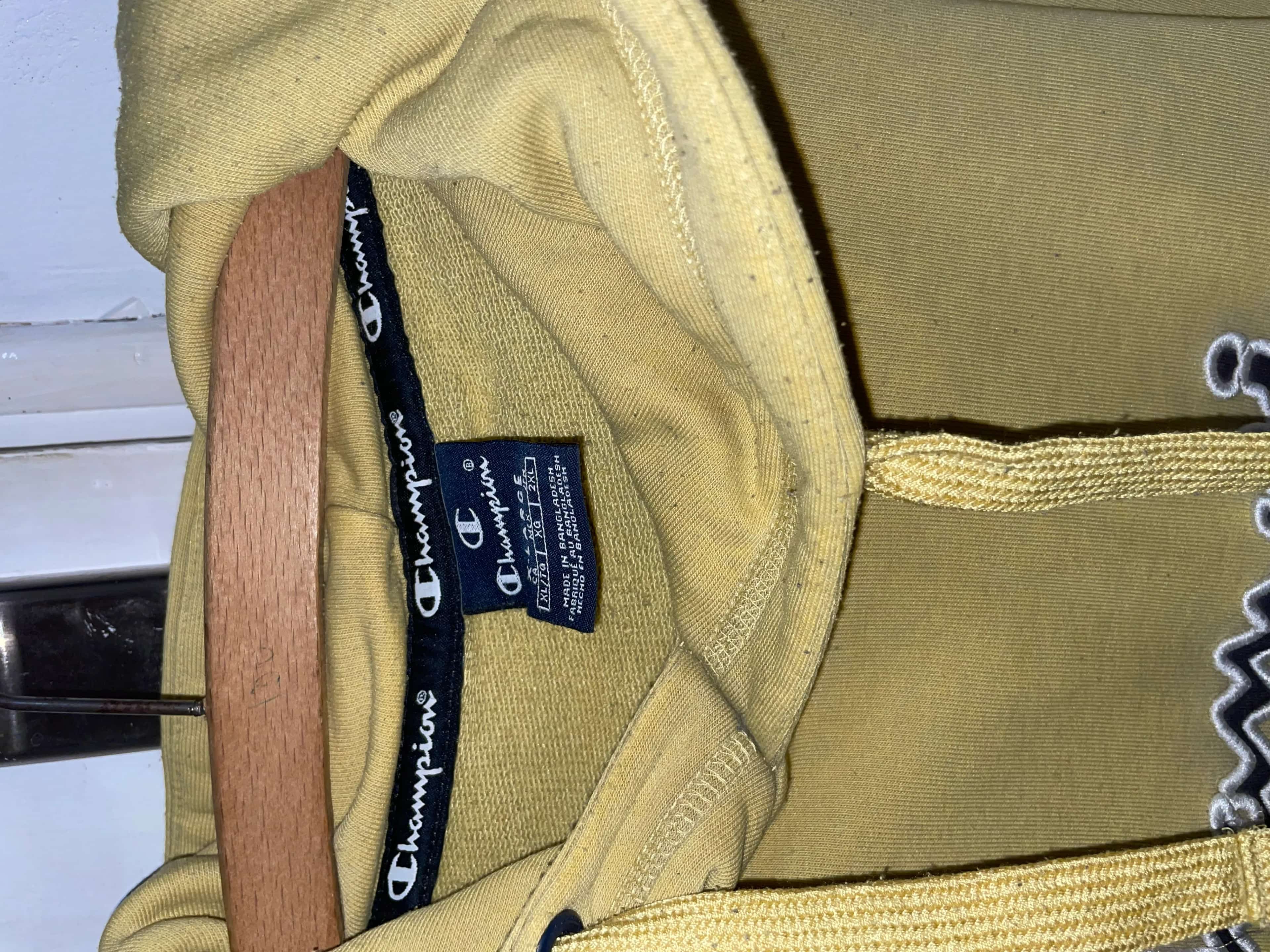 Ormar.app | sajt za prodaju garderobe | Champion žuti muški duks